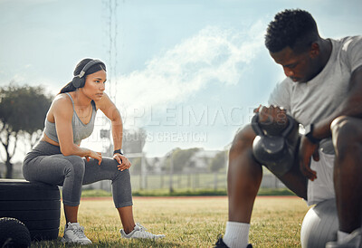 Buy stock photo Full length shot of a young athletic couple exercising together outdoors