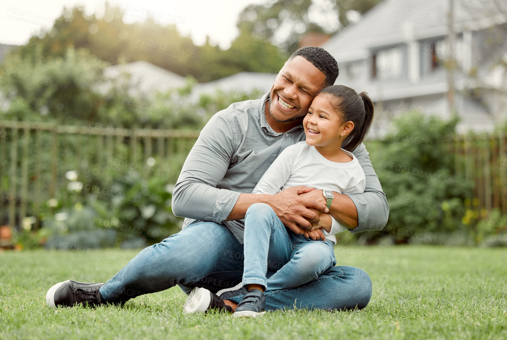 Buy stock photo Smile, father and hug child on grass for love, care or family laughing together to relax. Dad, kid and embrace girl at backyard outdoor for connection, support and single parent celebrate custody win