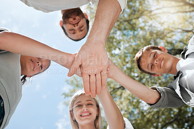 Buy stock photo Family, huddle and children hands together with portrait and smile from motivation with parents in park with love. Trust, below and backyard with care and support in circle with solidarity and fun