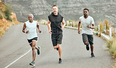 Buy stock photo Shot of a group of men exercising in nature