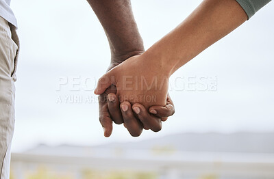 Buy stock photo Outdoor, couple and holding hands for unity with love for support, care and bonding. People, relationship and back outside with trust for solidarity, respect and comfort as lovers together in closeup