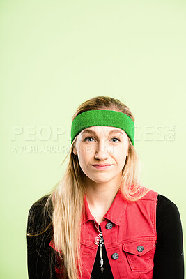 Buy stock photo Retro, fitness and portrait of girl with headband, serious and workout coach for gym in studio. Pride, face and woman with vintage style, exercise fashion and confidence on green background in USA