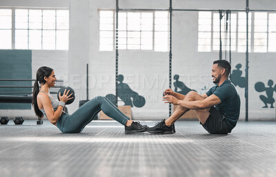 Buy stock photo Active, sporty fitness couple or gym partners training together, doing core exercises with heavy equipment. Male trainer and female athlete having a fun workout session or class to build strength