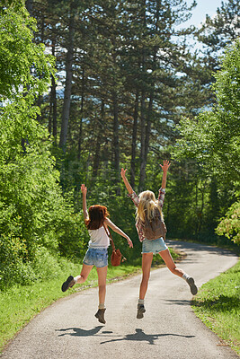 Buy stock photo Back, jump and walking with friends in forest together for adventure, hiking or journey in summer. Celebration, freedom and having fun with women outdoor in nature for holiday, tourism or vacation