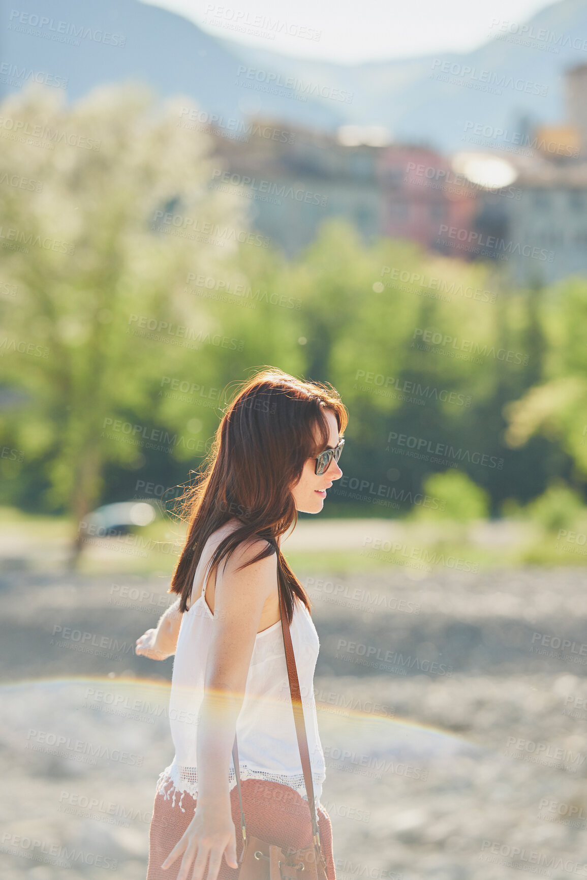 Buy stock photo Happy woman, freedom or holiday with sunglasses in nature for outdoor weekend, travel or trip. Carefree female person, trees and walking in sunlight for tourism, carefree day or adventure on vacation