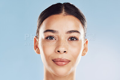 Buy stock photo Woman, portrait and natural beauty in studio, skincare and facial treatment results on blue background. Female person, confident cosmetics and dermatology for skin tone, transformation and pamper