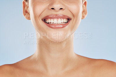 Buy stock photo Woman, smile and closeup in studio for skincare, beauty and cosmetic with healthy skin, glow or texture. Model, mouth and happy on blue background for dermatology, aesthetic and facial transformation