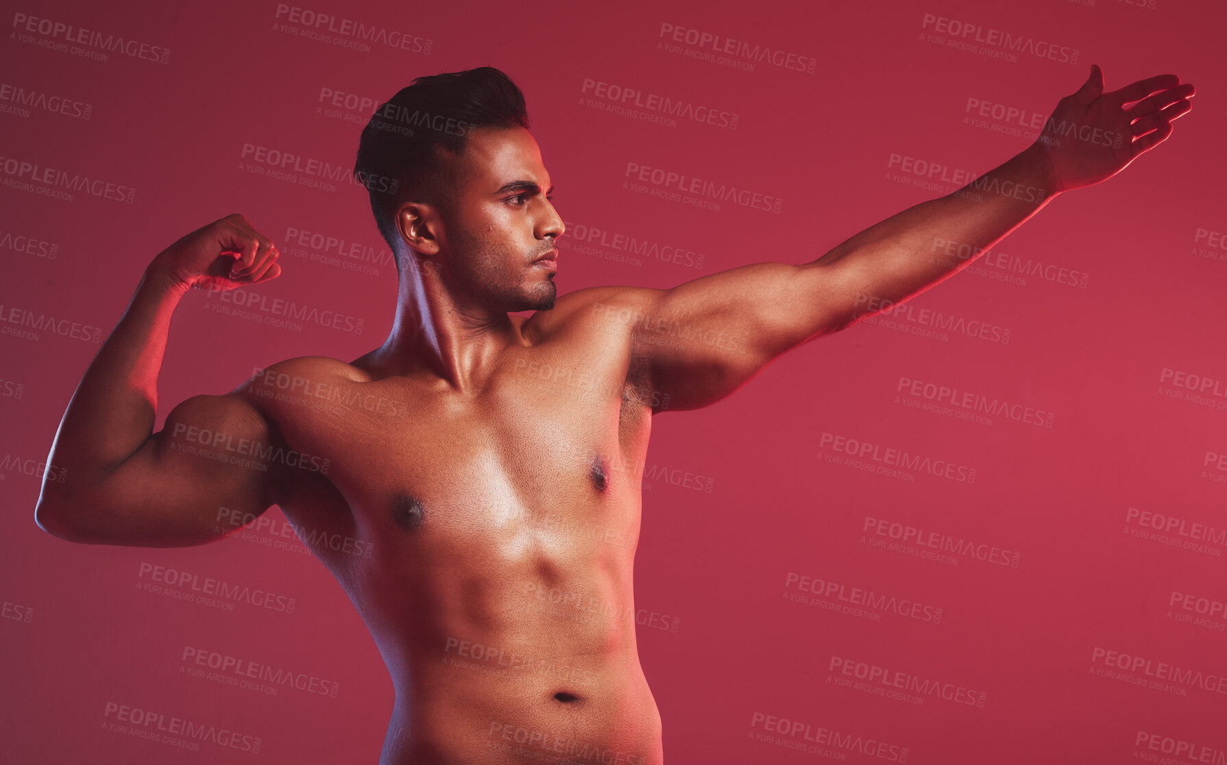 Buy stock photo Fitness, muscle and man on red background with flex for health, stretching and strength in studio. Workout, bodybuilder and isolated person with strong body for exercise, training and wellness