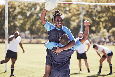 Buy stock photo Rugby, team and happy with celebration on field with ball for winning score or touchdown, victory and achievement. Football, diversity and people with athletic success on grass, competition and game.