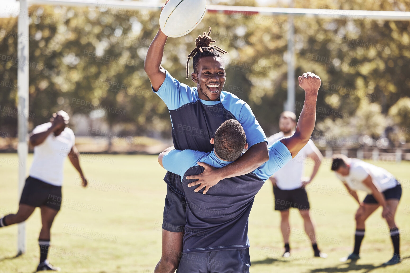 Buy stock photo Rugby, team and happy with celebration on field with ball for winning score or touchdown, victory and achievement. Football, diversity and people with athletic success on grass, competition and game.