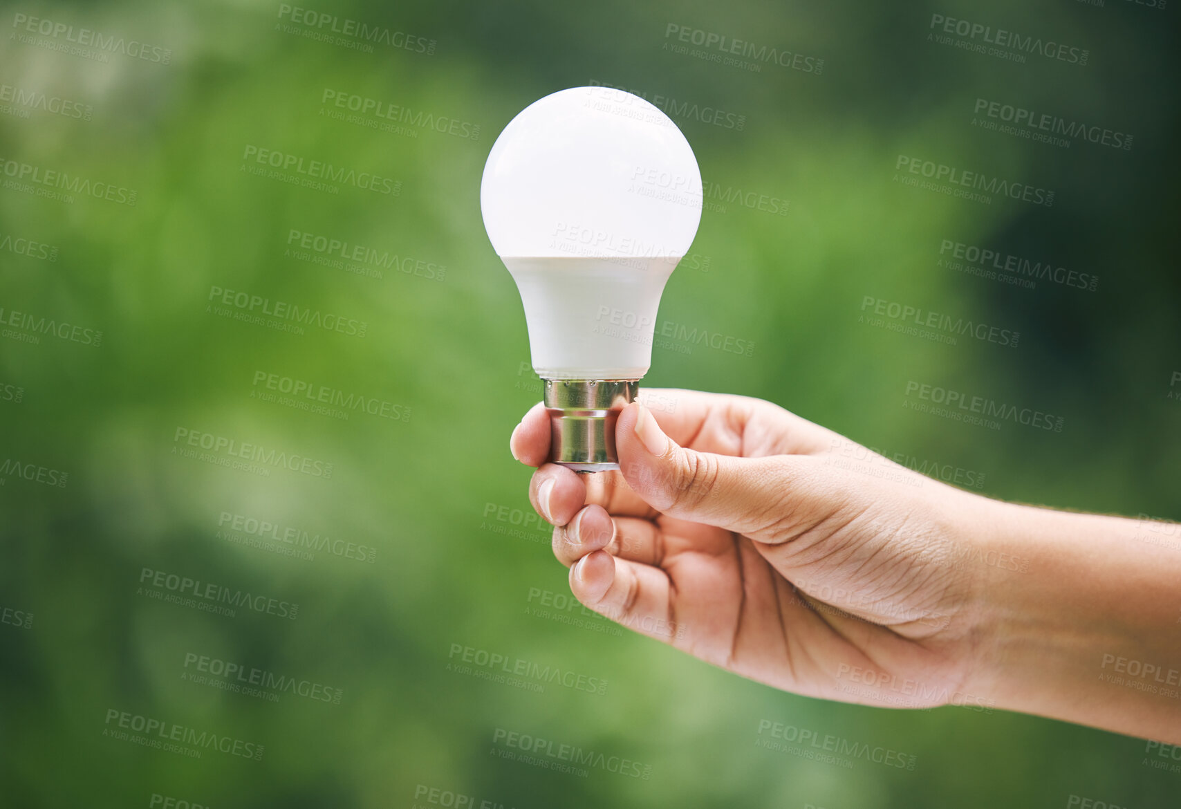 Buy stock photo Hands, green and light bulb for eco friendly, sustainability and idea with renewable energy innovation. Person, creativity and solar power lamp for electricity, inspiration or global transformation