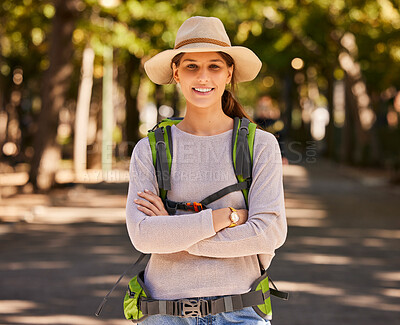 Buy stock photo Portrait, hiking and woman in hat arms crossed on holiday, vacation or trip. Travel, freedom and female from Canada on hike, explore or adventure outdoors in nature, having fun or spending time alone