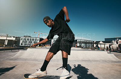 Buy stock photo Black man, skater on skateboard and skate trick in a park in  Los Angeles California summer sun for fitness, exercise and fun. Extreme sports athlete, cardio workout and skating competition training 