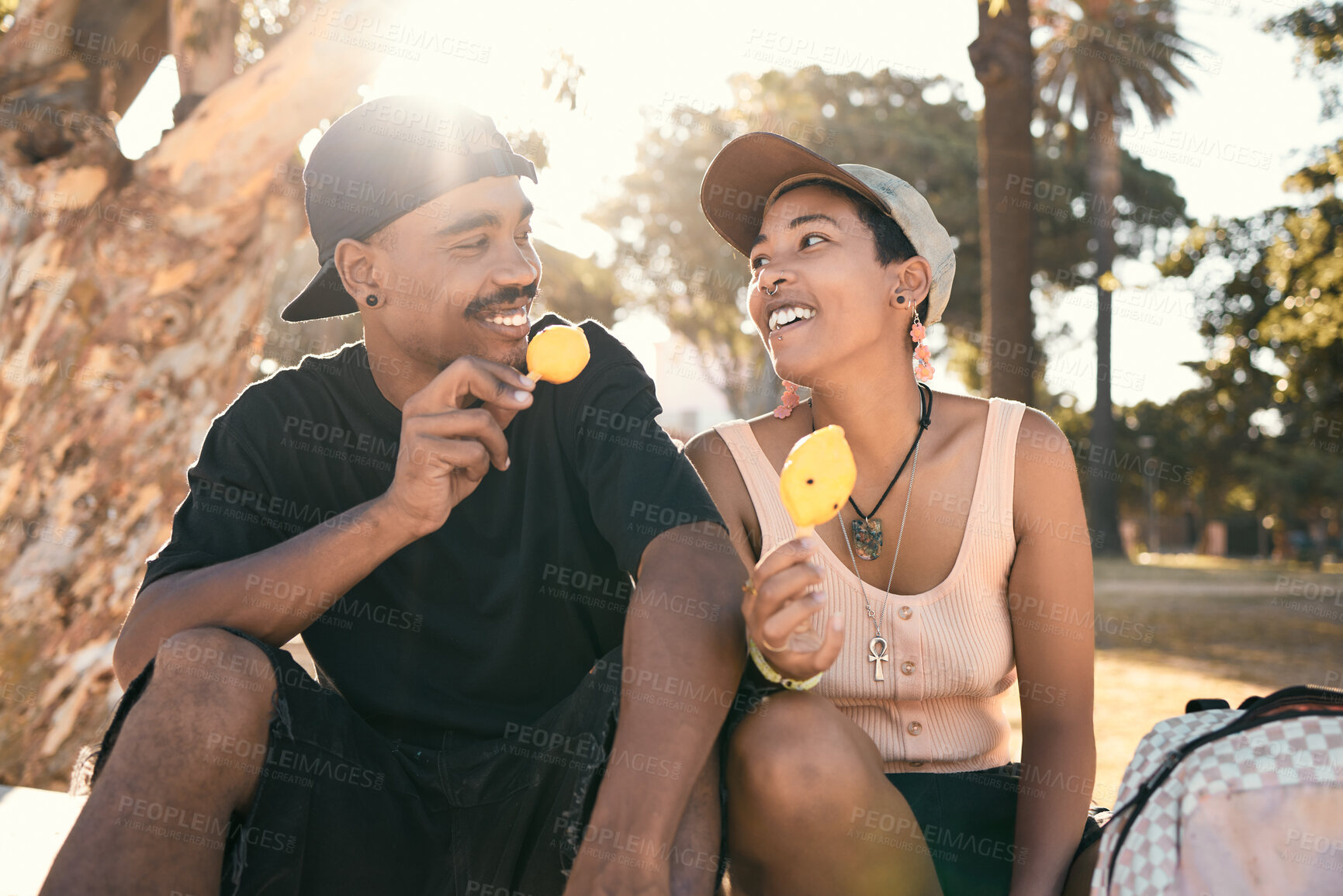 Buy stock photo Happy, ice cream and couple in nature talking while on an adventure, holiday and journey in Mexico. Happiness, smile and young man and woman eating a dessert while on an outdoor date on vacation.