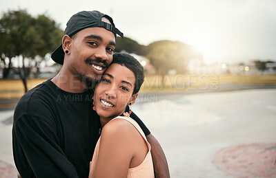 Buy stock photo Skate, love and portrait of black couple hug in city enjoying weekend, free time and summer. Skating, trendy fashion and young black man and woman in relationship, dating and embrace in skate park