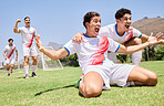 Winner, success and soccer competition team excited with game achievement, celebration and champion victory. Happy South Africa football athlete people winning tournament together on field.
