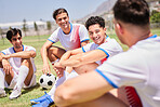 Soccer, relax and team on a football field talking, team building and laughing at a funny joke at training. Happy, fitness and sports athletes bonding and enjoying conversation after a game in Brazil