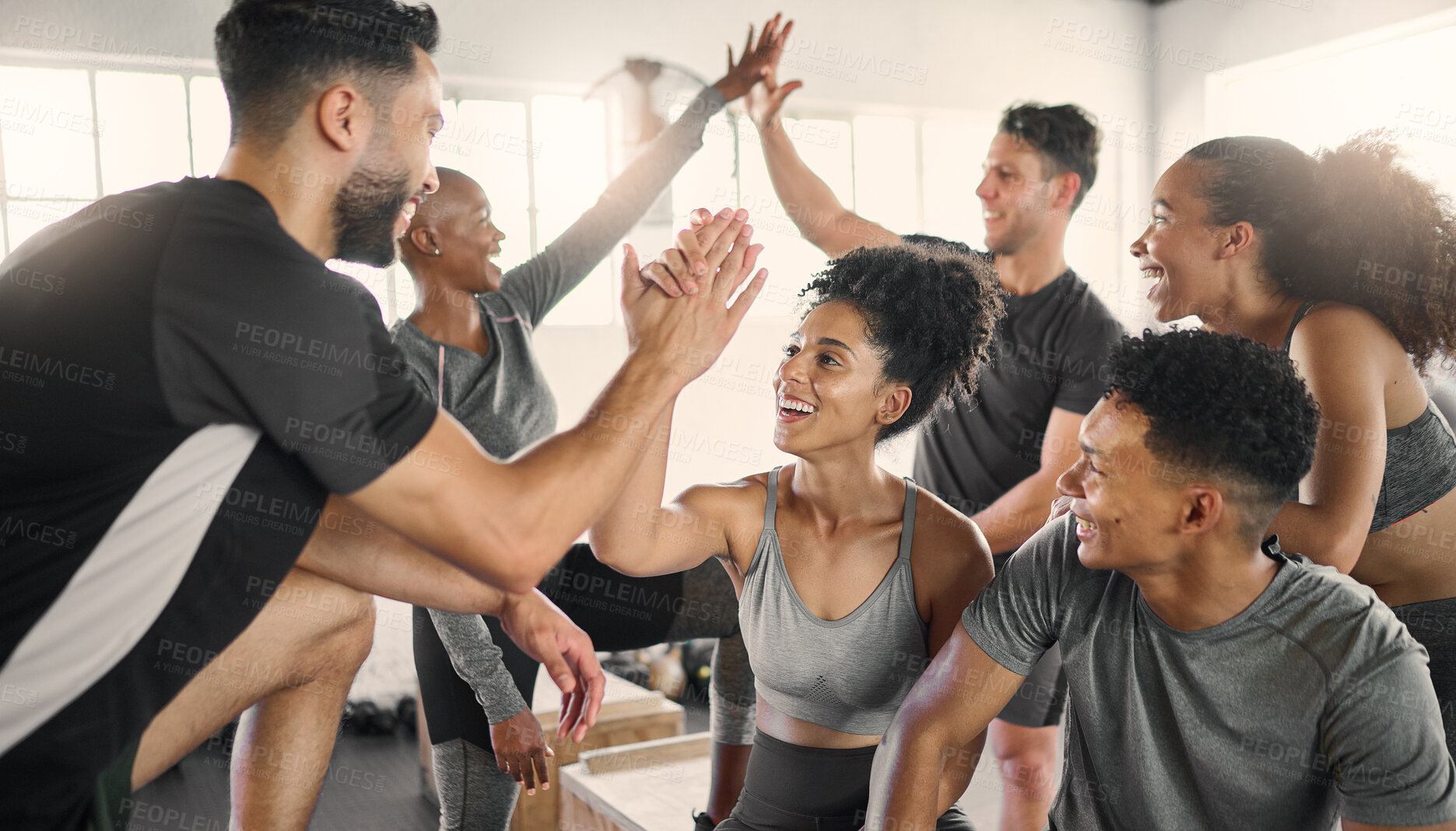 Buy stock photo Fitness, high five and group at the gym in celebration of fitness goal, achievement and success. Sports, team building and motivation of athletic friends after intense training, workout or exercise.