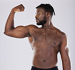 Black man, fitness and flex muscle for sports training in studio for strong body, biceps and power. Health and wellness of sexy male bodybuilder model with growth motivation after exercise workout