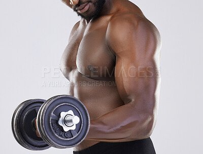 Buy stock photo Black man, strong muscle and dumbbell training for power workout in studio. Body of a sexy bodybuilder person doing fitness exercise with weights for growth, health and wellness with bicep progress