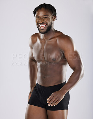 Buy stock photo Black man, fitness and happy body portrait of sports person in studio for strong muscle and underwear. Health and wellness of sexy male bodybuilder laughing after exercise, workout and training 