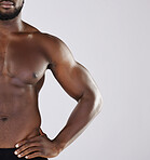 Closeup, black man and fitness for with health, muscular or wellness with guy on grey studio background. African American male, athlete or bodybuilder bare, chest or pecs with motivation for exercise