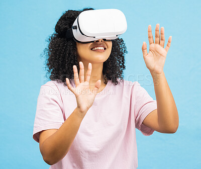 Buy stock photo Black woman with virtual reality glasses, happy with hands in metaverse, VR and futuristic tech isolated on blue background. Gaming, web and augmented reality, ux in studio and future technology