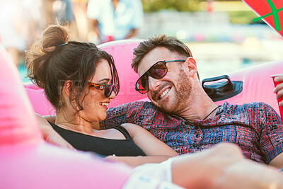 Buy stock photo Happy, relax and couple talking at a party, conversation and holiday together in summer. Drinks, smile and man and woman in communication at a pool social to celebrate, have fun and vacation in Bali