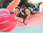 Pool party, portrait and happy couple floating in the water together while on vacation at a resort. Float, summer and young man and woman in a swimming pool having fun on a holiday or weekend trip.