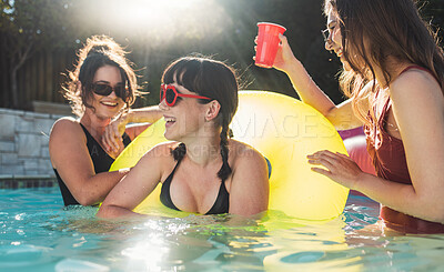 Buy stock photo Friends, women and pool party, summer and fun for holiday, break and bonding together, playful smile and weekend. Young people, girl or females in water, event and celebration on vacation and playful