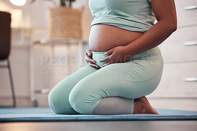 Buy stock photo Pregnant, yoga and black woman on mat, stomach and training for healthcare, prenatal and wellness. Pregnancy, African American female and lady with tummy, floor and meditation with pilates training