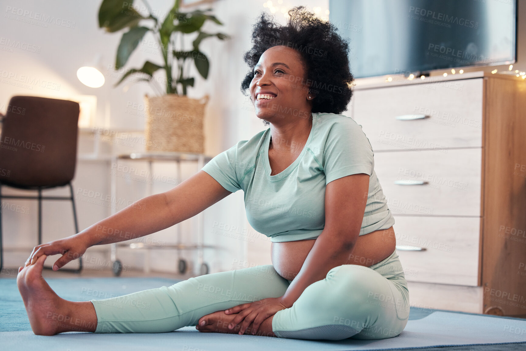 Buy stock photo Yoga, pregnant and black woman stretching legs in home for flexibility, health or fitness. Pregnancy, zen pilates and future mother or mama thinking while training, exercise or workout for wellness.