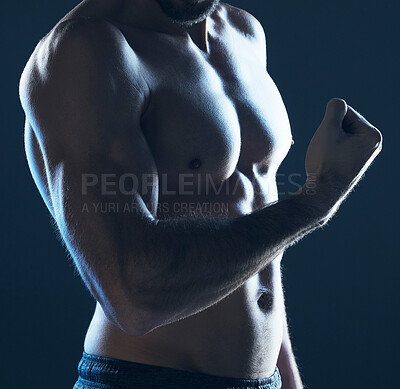 Buy stock photo Fitness, body and man flexing arm on blue background, isolated, neon blue light and muscular chest. Sports, muscle and topless male model in artistic dark studio for power workout and gym aesthetic.