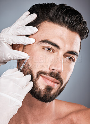 Buy stock photo Filler, man and facial injection for skincare, collagen and beauty clinic in studio. Plastic surgery, face needle and male aesthetic for body transformation, cosmetics change and derma on background