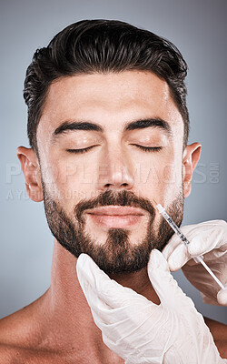 Buy stock photo Face injection, man and plastic surgery for skincare, collagen and beauty clinic in studio. Cosmetics, needle and male aesthetic for body transformation, filler change and facial prp on background