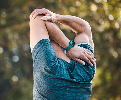 Buy stock photo Arm stretching, outdoor and man in a park with sport injury and muscle pain from fitness and workout. Exercise physio, body of person and back with medical, health and problem from training accident 