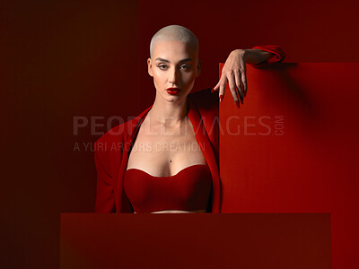 Buy stock photo Fashion, portrait and confident woman in red suit in studio isolated on a background mockup space. Face, makeup and serious female model with cosmetics, aesthetic or classy clothes from Switzerland.