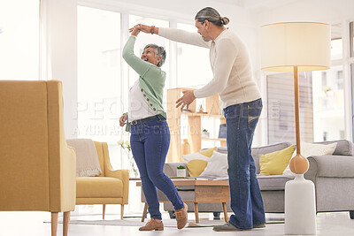 Buy stock photo Happy, mature couple and dancing at home for anniversary, birthday or valentines celebration. Laugh, love and care of man and woman for healthy marriage, happiness and moving or spin with a smile