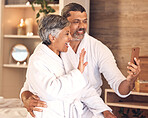 Video call, wave and love with old couple in spa for anniversary, celebration and social media. Relax, massage and communication with senior man and woman in villa for luxury, vacation and peace