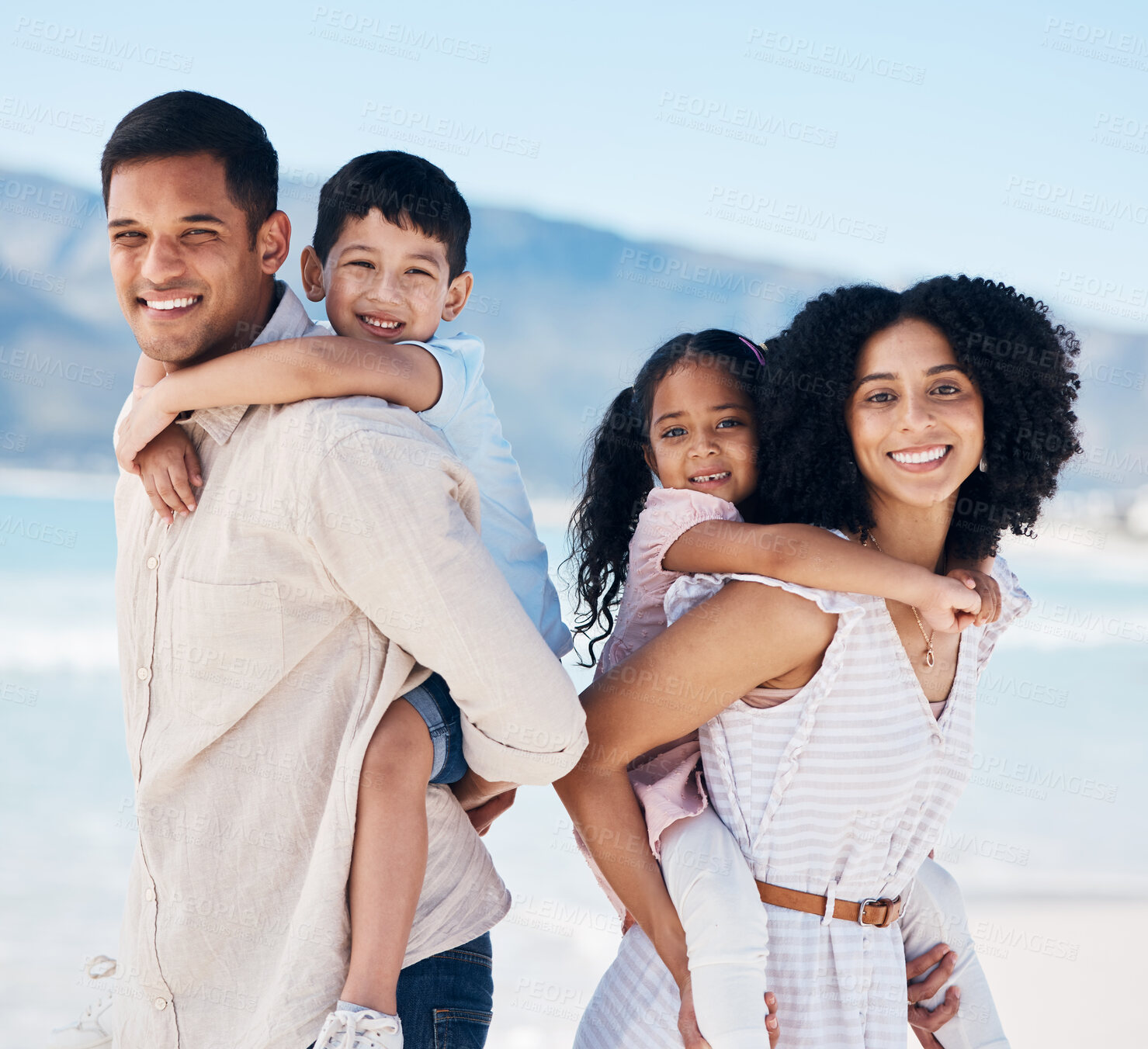 Buy stock photo Parents, children and beach portrait with piggy back, care and love with adventure, freedom or holiday in sunshine. Father, mother and daughter with son, smile or outdoor for summer vacation by ocean