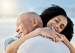 Hug, beach and woman with her senior father on family vacation, holiday or adventure. Happy, smile and young female person from Mexico embracing her elderly dad with love by the ocean on weekend trip