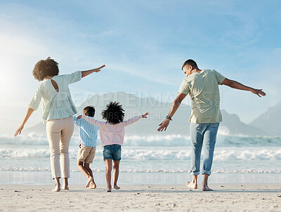 Buy stock photo Playing, airplane and family on beach with freedom on vacation, holiday or summer in Brazil with parents and children. Mom, dad and kids play game as plane to fly for fun, bonding and happiness