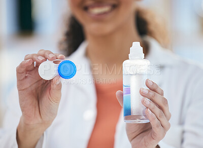 Buy stock photo Optometry, contact lens and solution in hands, container and healthcare with eye care and wellness closeup. Person with bottle, vision and optometrist at clinic, case for lenses with advice and help