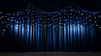 Empty theater stage with blue velvet curtains. Spotlight showtime copy space