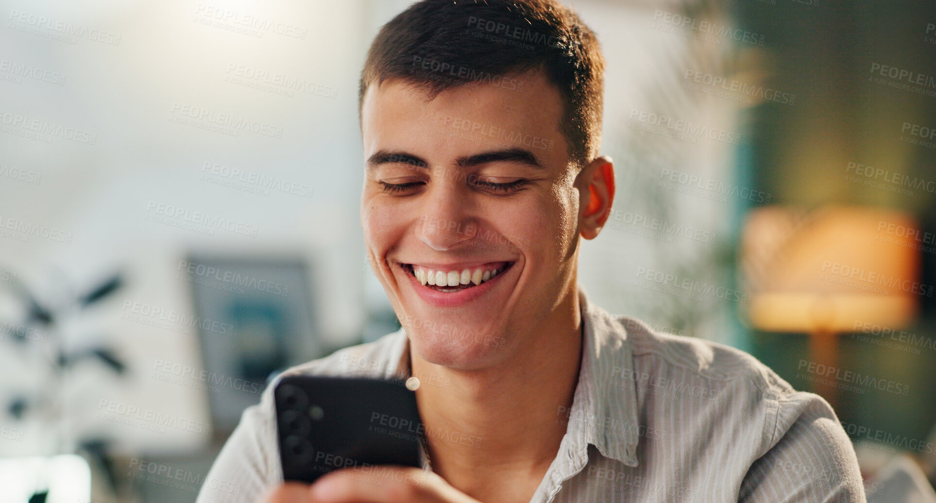 Buy stock photo Joke, laughing and man with phone for online meme with social media, internet gif and reading crazy story in office. Male person, mobile app and website for streaming funny video or comedy film