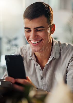 Buy stock photo Joke, laugh and happy man on smartphone for social media, message and meme for fun. Male person, technology and smile on internet for mobile app, funny video and communication in workplace on web