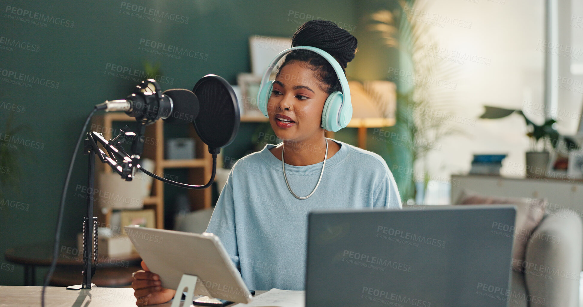 Buy stock photo Woman, apartment and broadcast with microphone for radio, communication or podcast on air. Female presenter, live streaming or headphones for music playlist, home office with gear for audio talk show