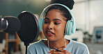 Podcast, presenter and talk show on radio with microphone and reporter woman with live streaming. Content creator, speaker and recording studio with influencer, broadcast and dj with sound production