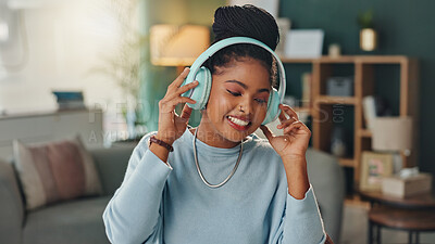 Buy stock photo Headphones, dance and woman with smile in house for online audio, subscription and listening to music. Happy, person and technology with internet at home for sound, streaming service or entertainment