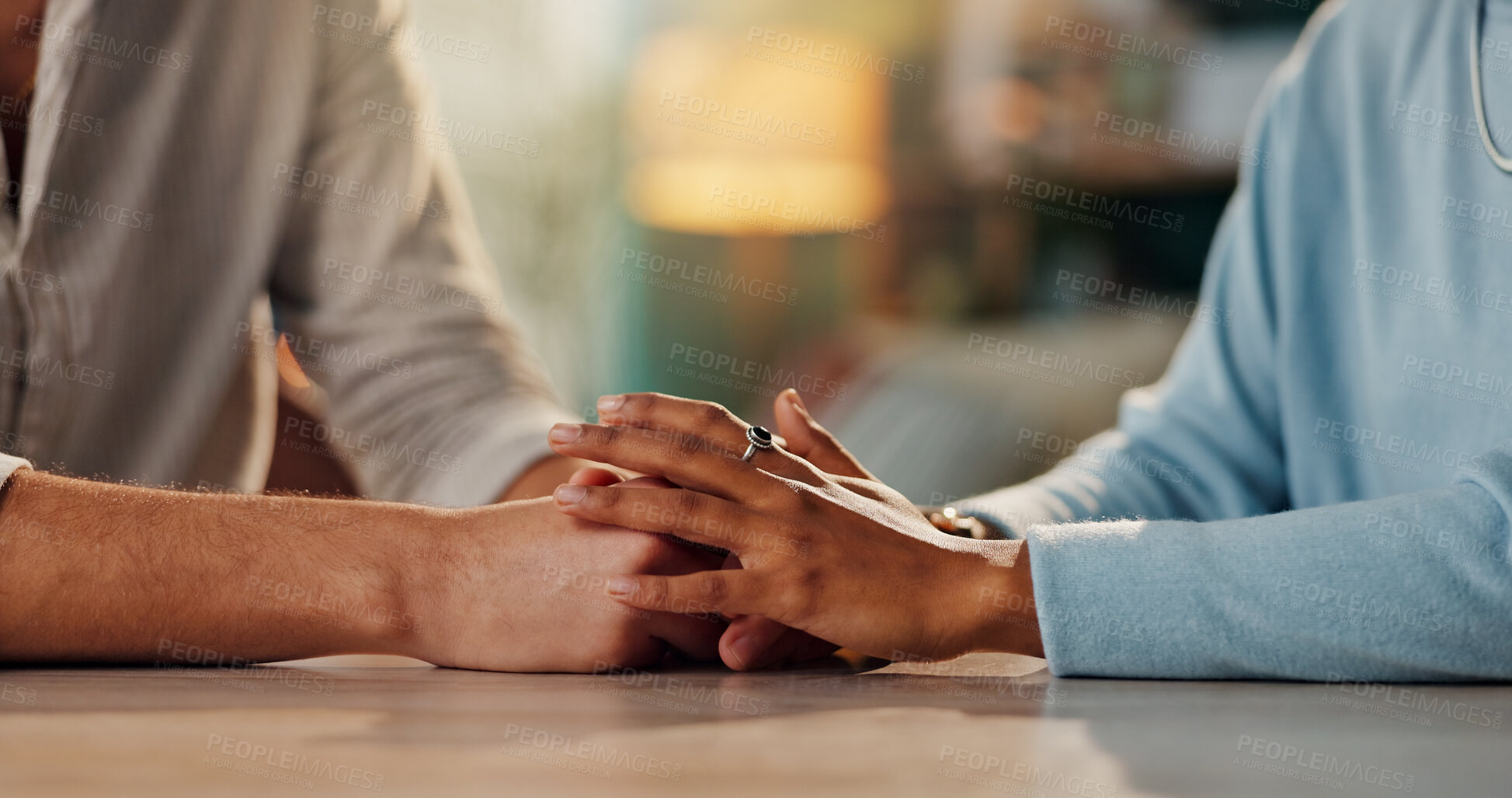 Buy stock photo People, hands and table with empathy for relationship, .... or trust in house. Couple, together and solidarity in home with support or kindness, helping others with comfort or prayer in living room